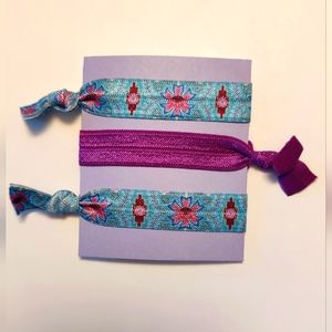 Hand crafted hair ties.